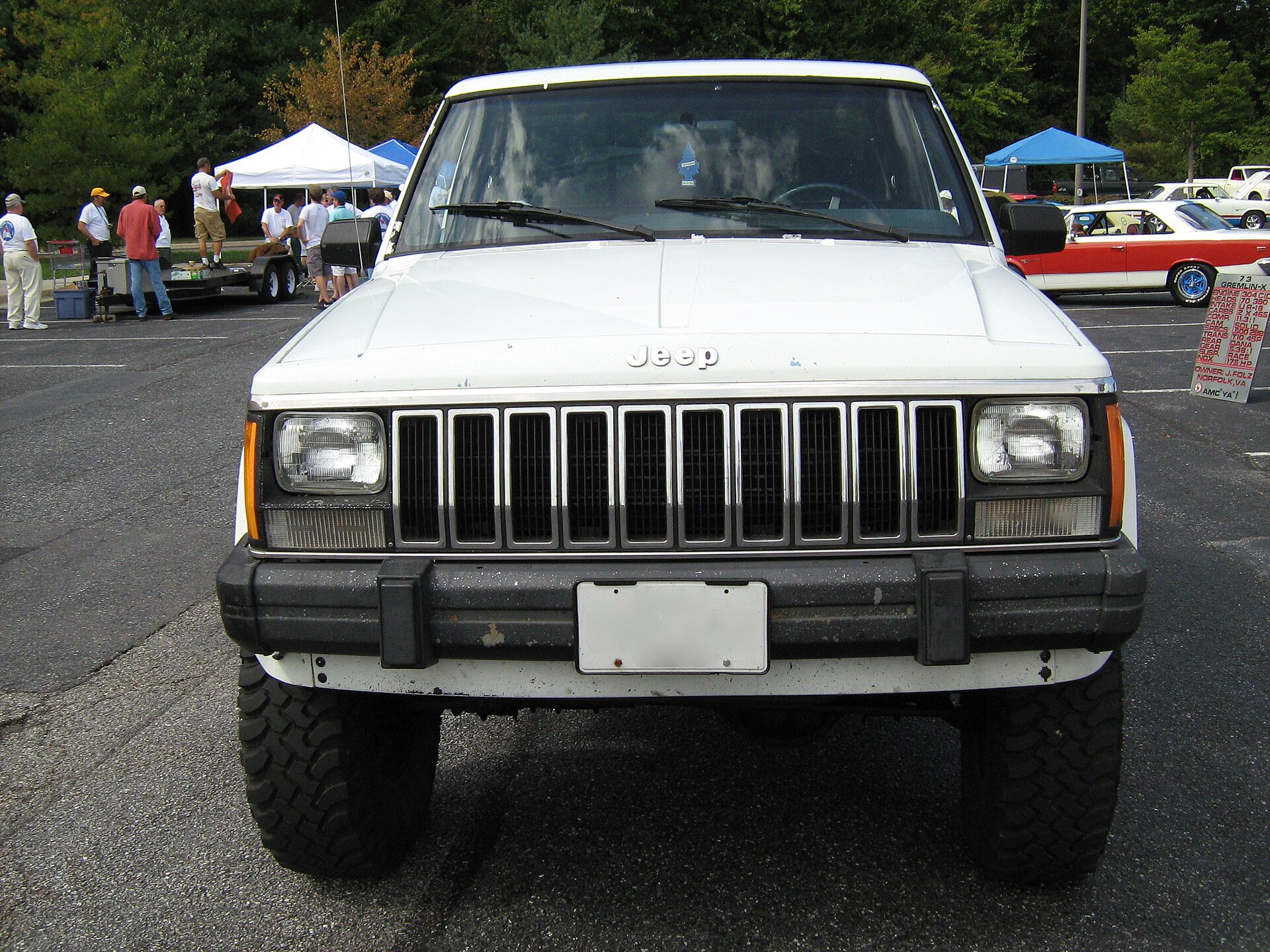 A white Jeep Comanche MJ Pioneer pickup